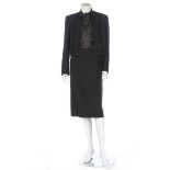 A Chanel Créations black wool-blend suit, early 1980s, labelled and size 10,