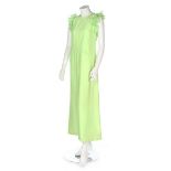 A Courrèges acid-green silk evening dress, circa 1972, Couture Future labelled and numbered 0016243,