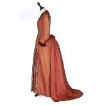 A group of clothing, mainly 1890s, comprising: printed silk and brown velvet dress,