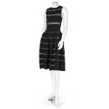 An Azzedine Alaïa black viscose dress, modern, labelled and size L,