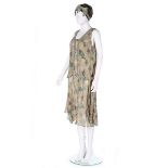 A printed lamé cocktail dress, the fabric 1930s, made in a 1920s style,