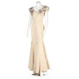 An ivory silk-pique silk evening gown with jewelled collar, late 40s-early 50s,