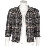 A Chanel wool and angora patchwork cropped jacket, modern, in shades of grey, chest 92cm,