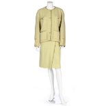 A Chanel pale green tweed suit, probably 1990s, un-labelled, the jacket with gilt 'coin' buttons,