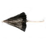 A folding carriage parasol, circa 1860, with ivory ferrule,