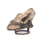 An embroidered silk shoe with matching wood and iron patten, 1770-80,