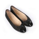 A pair of Chanel black rubberised cotton ballet pumps, modern, stamped to interior and size 38,