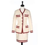 A Chanel boutique slubbed-silk cream suit, 1980s, labelled and size 36,