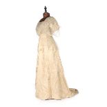 An ivory silk lace bridal gown, circa 1914 and others,