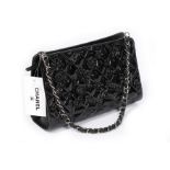 A Chanel black embossed patent leather handbag, modern, stamped to interior and numbered 13330108,