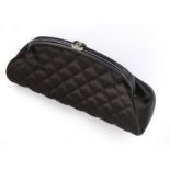 A Chanel quilted black satin clutch bag, modern, stamped to interior,