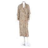 A Chanel boutique tweed summer coat, 1998, labelled and size 40, double-breasted with fringed edges,
