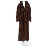 A fine Fendi brown mink coat, labelled, floor-length with singular button fastening,