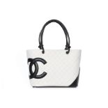 A Chanel quilted white leather shopper, 1990s, stamped to interior, authentication card no 10011094,