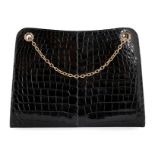 A Cartier black crocodile handbag with 9ct rolled gold chain, early 1960s, crocodylus porosus,