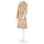 A Noble Furs blonde mink coat, 1960s, un-labelled, mid-length with curved hem, two front pockets,