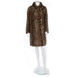 A Brahams of Norwich ocelot coat, 1950s, labelled, knee-length, with two front pockets,