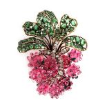 An Iradj Moini oversized 'raspberry' brooch, 1990s, signed, the pink moulded glass berries,