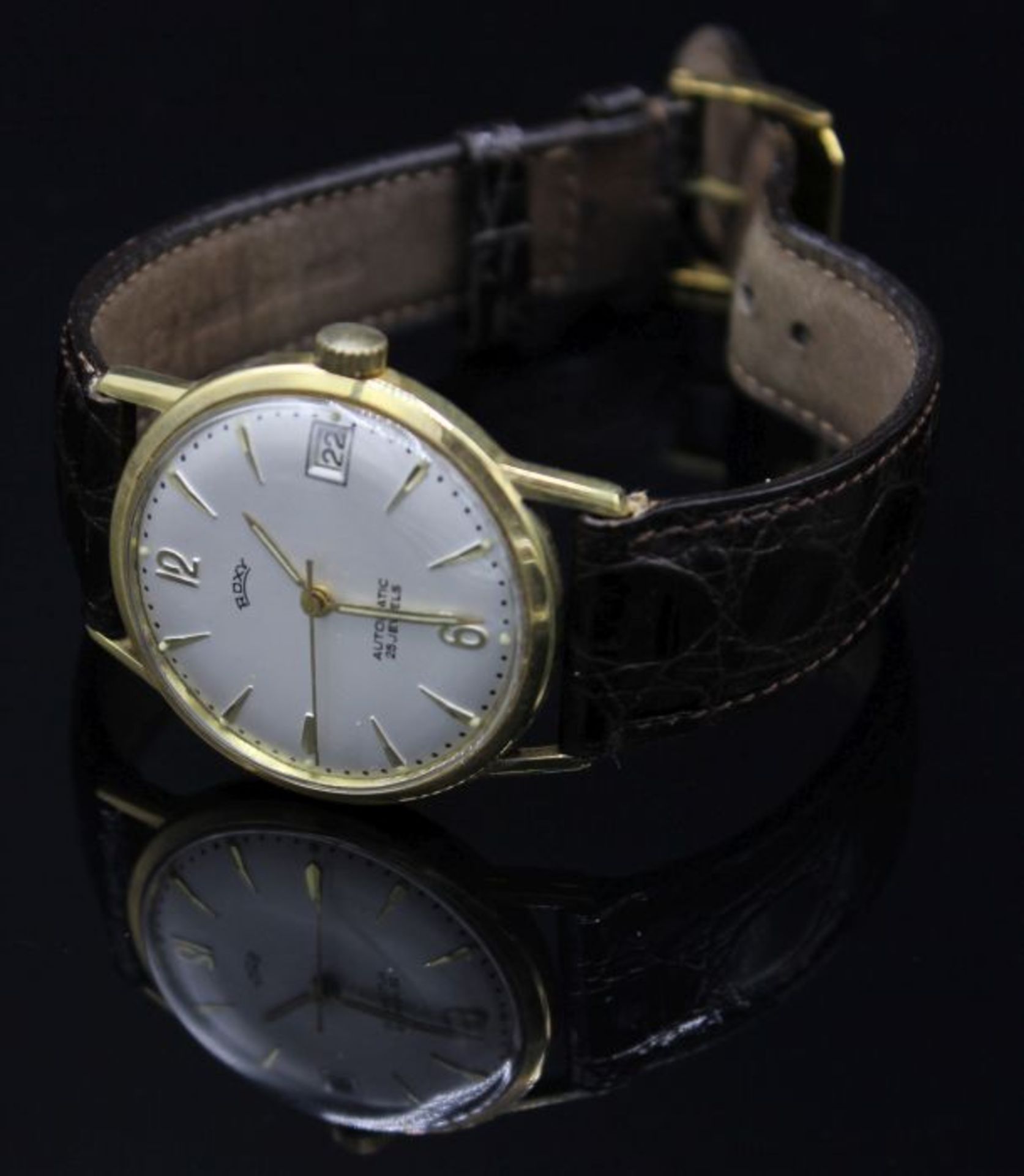 Goldene Armbanduhr - Marke Roxy im Gehäuse Rückdeckel gest. 585, RP in Raute und Krone,