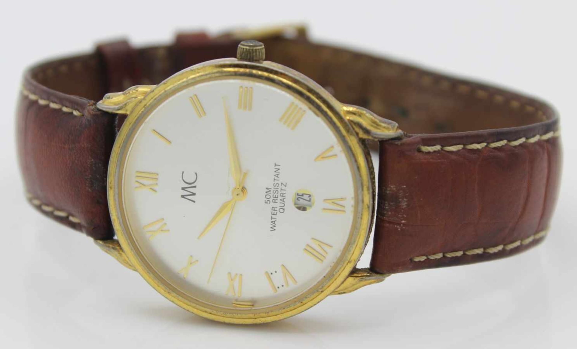 Armbanduhr - Marke MC silberfarbenes Zifferblatt mit vergoldeten Zeigern und Sekunde, vergoldete