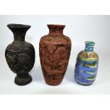 Three vases, including two resin carved and one ceramic (3)