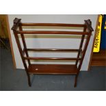 An Edwardian mahogany towel rail with inlaid stringing