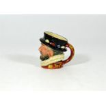 A Royal Doulton miniature character jug Beefeater GR handle with yellow highlights to handle