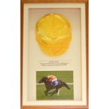 A horse racing cap signed by the jockey Ryan Moore