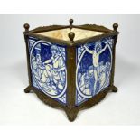 A Minton four tiled planter, tiles designed by Moyr Smith