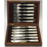 MAHOGANY CANTEEN OF MOP HANDLE FISH CUTLERY