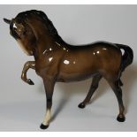 BESWICK BROWN HORSE HEAD TUCKED LEG UP