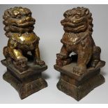 PAIR OF CAST METAL FOO DOGS WITH SOME GILDING 7'H