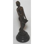 BRONZE OF READING NUDE TO MARBLE PLINTH 8'H