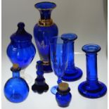 BLUE GLASS PAIR CANDLESTICKS & VASES (8)