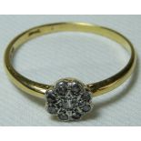 18CT GOLD FLORAL DIAMOND SET RING 2.07g