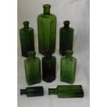 8 GREEN GLASS POISON BOTTLES