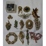 15 BROOCHES