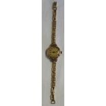 RANDS LEVER 9CT GOLD LADIES WRISTWATCH WITH 9CT GOLD STRAP