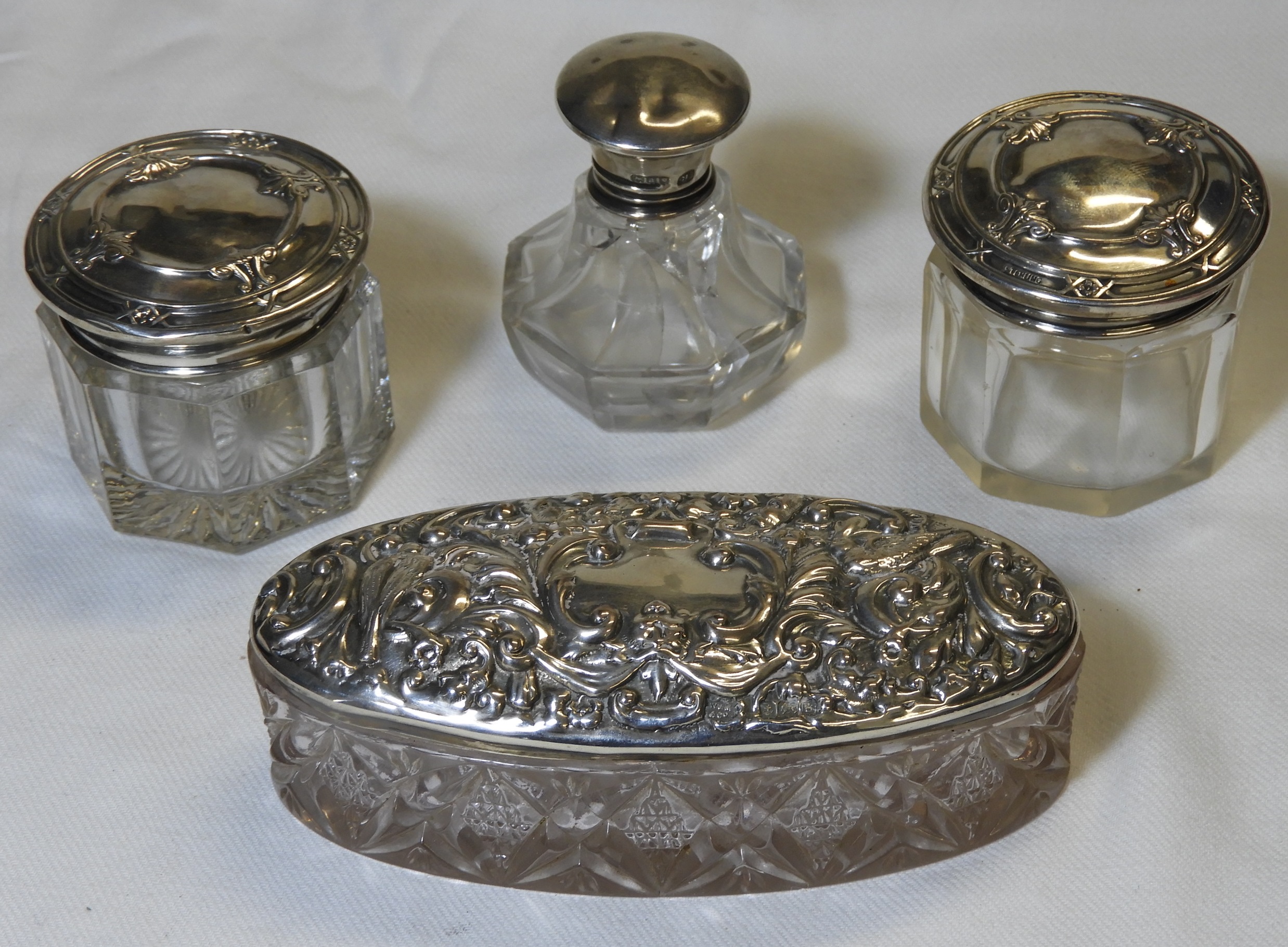 SILVER TOPPED 4 GLASS DRESSING TABLE PIECES