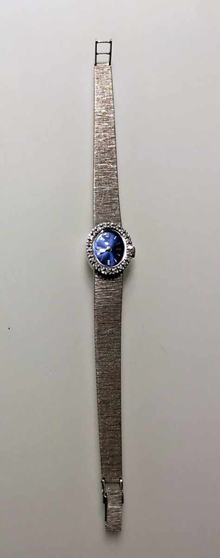 Damen Armbanduhr 18 kt. Weißgold mit kleine Diamantkranz. Gangbar, 70er Jahre. 22 g