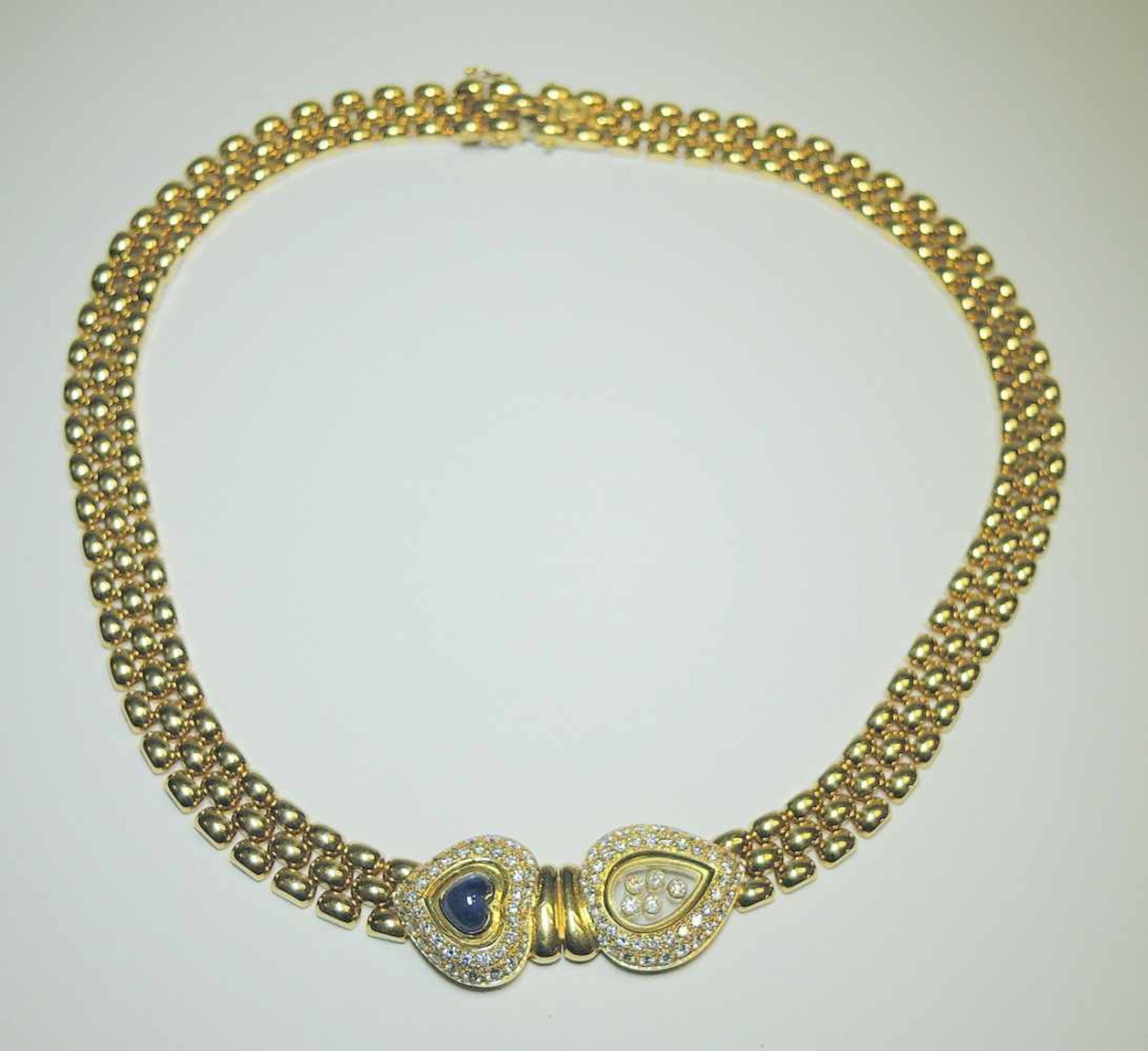 Feines Chopard Collier - Happy Diamonds 18 K. Gold, mit Saphir-Herz von ca. 3,5 ct. und