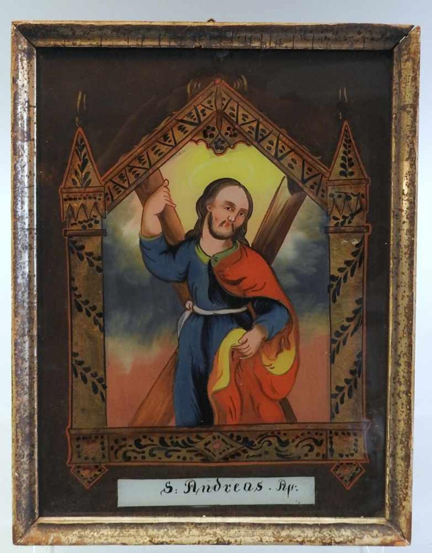 Heiliger Andreas Hinterglasbild, gerahmt. Darstellung des Apostels mit dem Kreuz des Märtyrertum.
