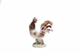 Kleiner Hahn, Meissen, um 1750 Kleiner Hahn, Meissen, um 1750, farbig bemalt, Höhe 8,4 cm.