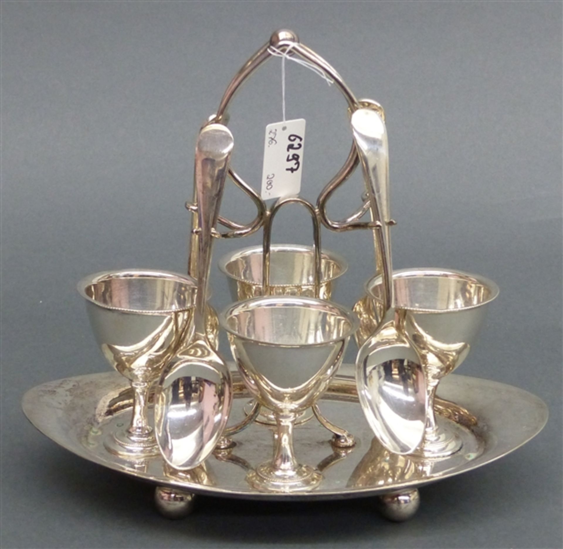 Frühstücksset, um 1900 Plate, England, 4 Eierbecher mit Löffel, in Halterung, punziert, h 18 cm,