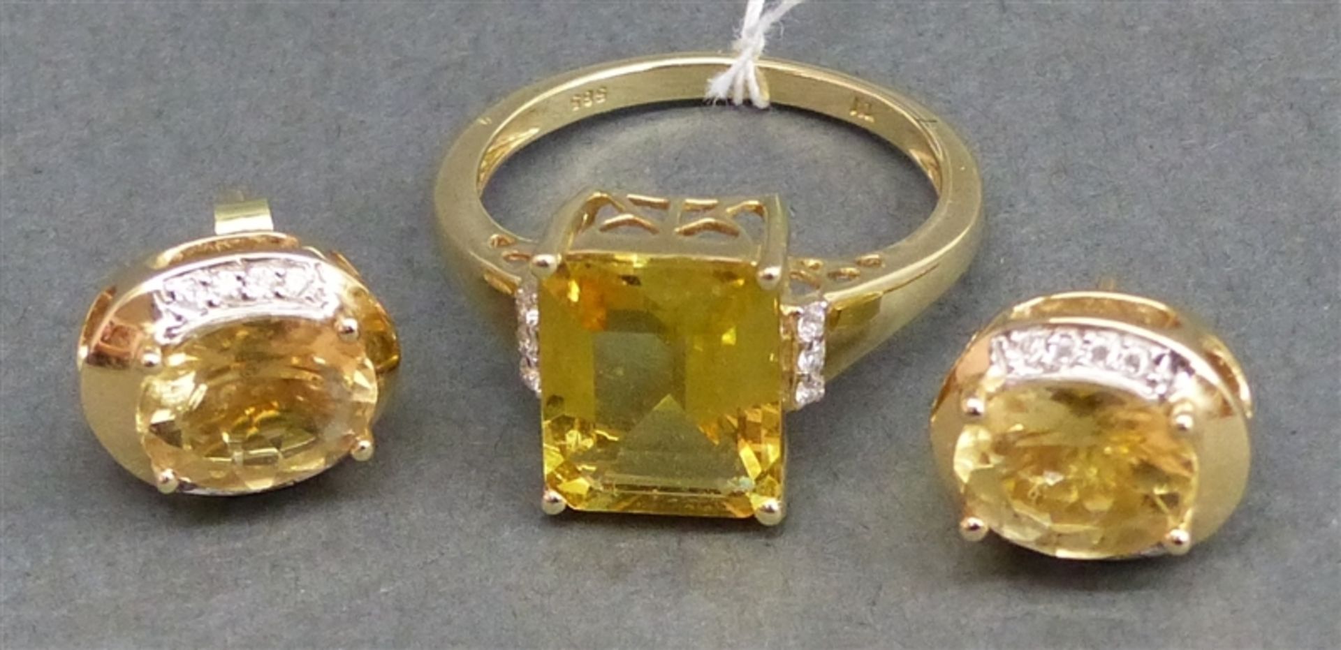 Schmuckgarnitur 14 kt. Gelbgold, 1 Damenring, 1 Citrin/Emeraldcut, 6 kl. Diamanten, ca. 5 g