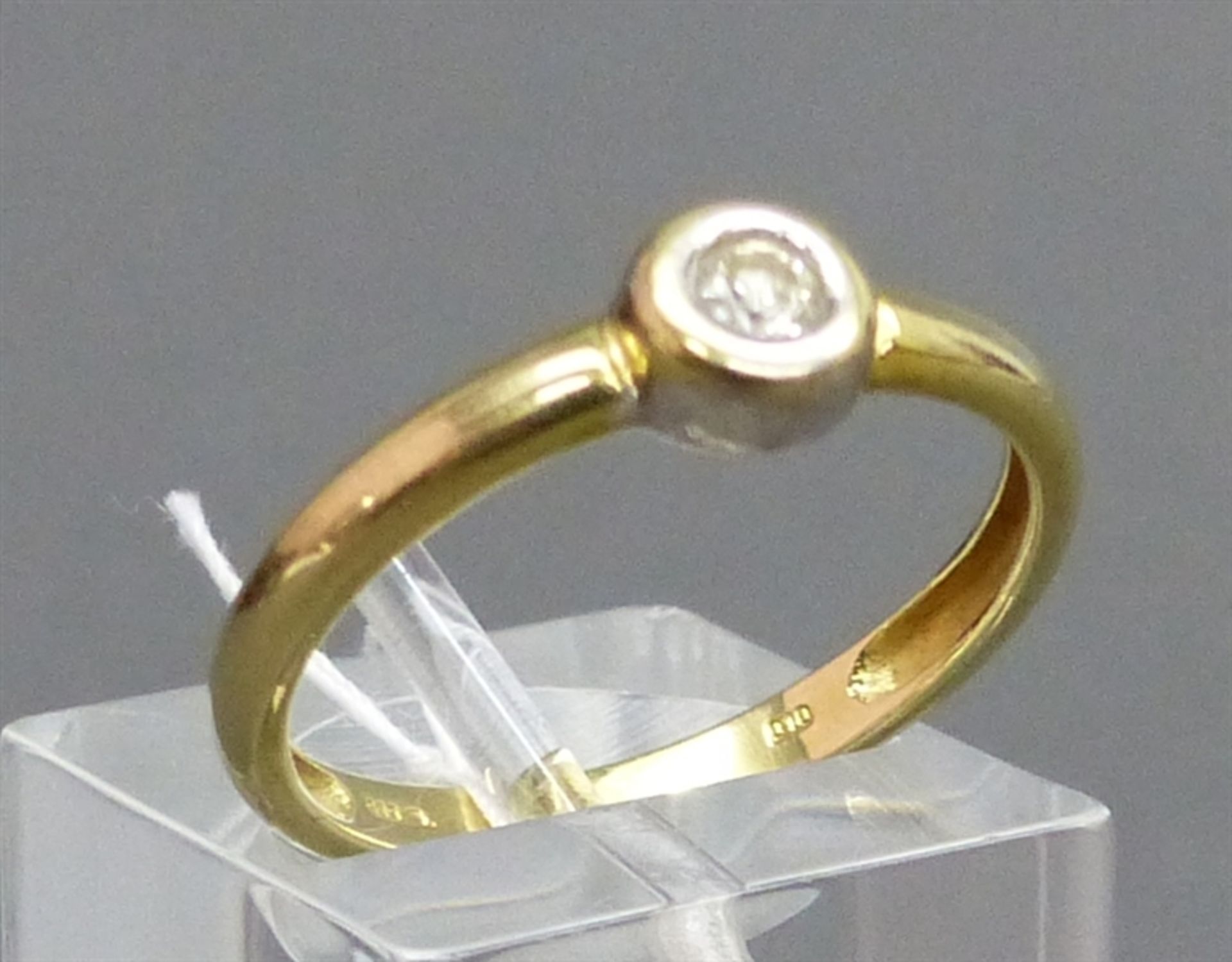 Damenring 14 kt. Gelbgold, 1 Brillant ca. 0,10 ct., yellow, ca. 2 g schwer, RM 57,