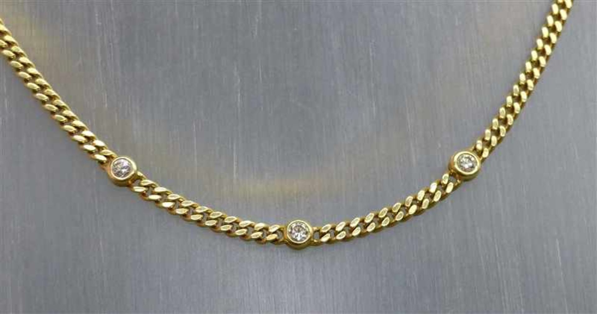 Collier 18 kt. Gelbgold, 3 Brillanten zusammen ca. 0,30 ct., top wesselton, vsi, Flachpanzerkette,