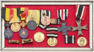 Konvolut Orden und Medaillen Versch. Metalle, z. T. emailliert. "Eisernes Kreuz 2. Klasse 1914 für