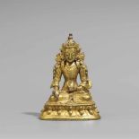 Buddha Ratnasambhava. Vergoldete Kupferlegierung. 19. Jh. Fürstlich geschmückt auf einem Lotos