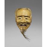 Nô-Maske vom Typ Sankôjô. Holz, farbig gefasst. Mitte 18. Jh. Kopf eines Greises mit faltenreichem